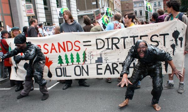 Protesters demonstrating Canada's tar sands development outside the Canadian High Commission in London. Photo by Zoe Cormier.