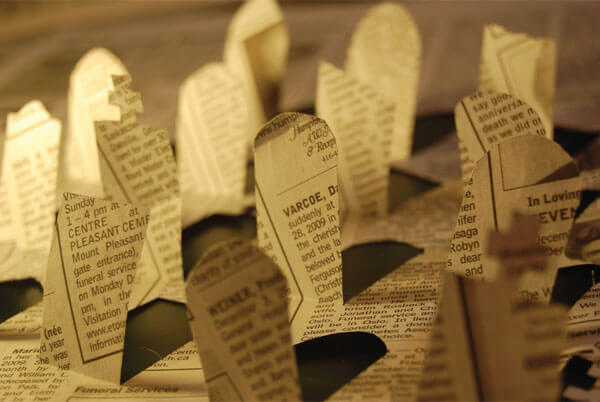 With the rise of paid death notices, the old-fashioned obit's days may be numbered. Photo by Graham F. Scott.