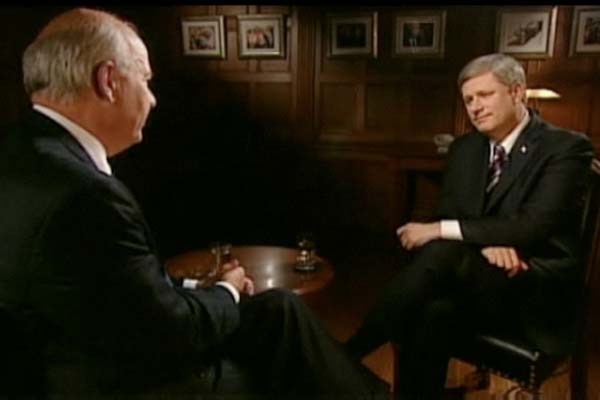 Peter Mansbridge interviewing Stephen Harper on CBC's the National, January 5, 2010. Screenshot from CBC broadcast.