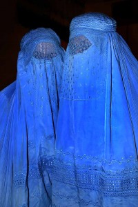Two Afghan women wear burkas in Northern Afghanistan. Creative Commons photo by Steve Evans.