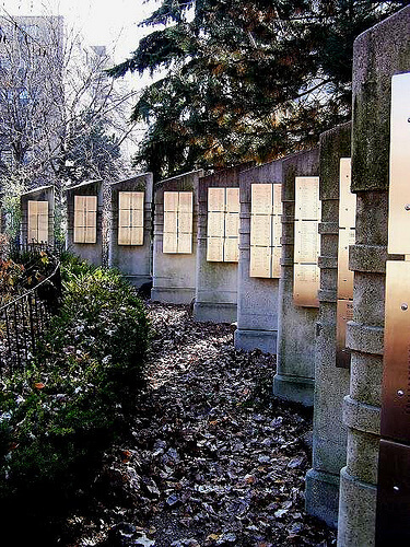 Concrete slabs and plaques with names at the AIDS memorial at 519 Church Street Community Centre, Toronto. Photo courtesy of Kenn Chaplin at Flickr.