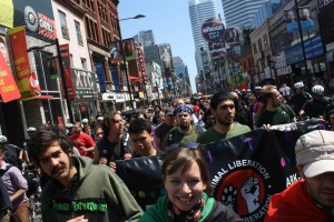 Protestors march down Toronto's Yonge Street as part of anti-G20 All Out In Defense of Rights Rally, Monday June 21 2010. Photo by Jesse Mintz.