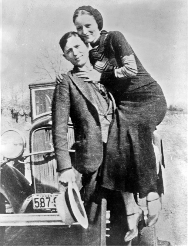 Bonnie and Clyde with their car, 1933